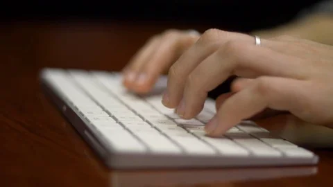 Hands Typing in Slo-Mo Stock Footage 74714868