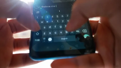 Hands Typing on Smartphone Keyboard, Close-up of hands typing on a smartpho.. Stock Footage 317736670