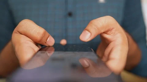 Hands Typing on Smartphone Screen, Close-up of hands holding a smartphone, .. Stock Footage 317736724