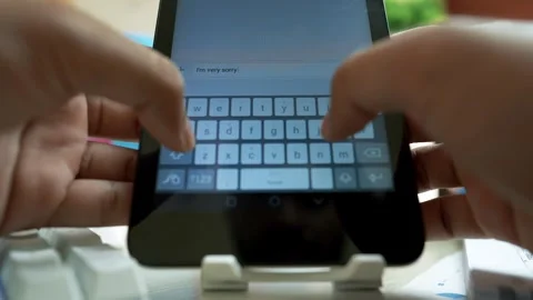 Hands Typing on Tablet with Virtual Keyboard Stock Footage 317737234