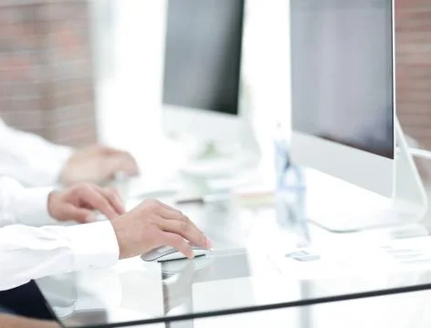 Hands typing text on the computer keyboard. blurred business background. Foto stock