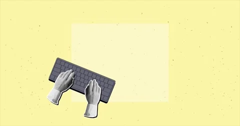 Hands typing text on the keyboard of an open laptop Stock Footage 310430733