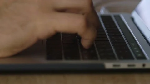 Hands typing text on slim notebook keyboard with Touch Bar Stock-Footage 122626602