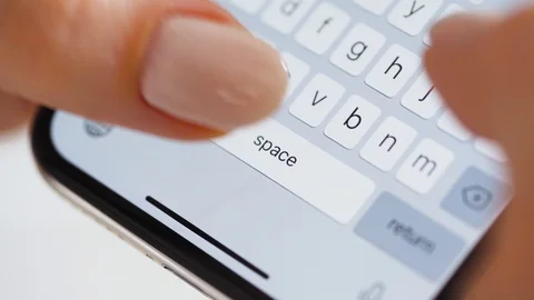 Hands typing text on smartphone close-up Stock Footage 127965243