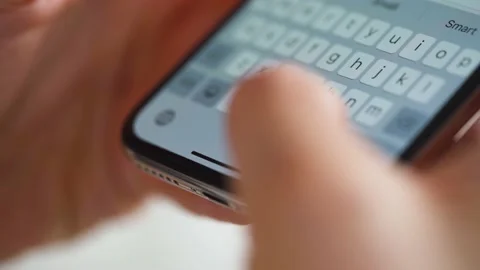 Hands typing text on smartphone close-up Stock Footage 133036280