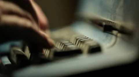 Hands Typing on Typewriter Stockbeeldmateriaal 21258008