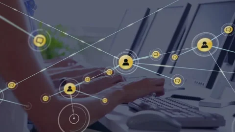 Hands typing while yellow node appearing sparking chat icons linking and Stock Footage 333145404