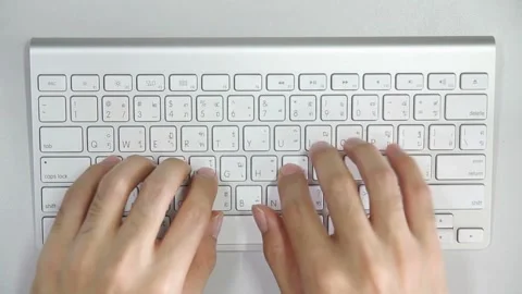 Hands Typing on White Keyboard for Work and Productivity Video stock 306394218