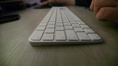 Hands Typing On Wireless Keyboard Video stock 321456780