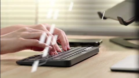 Hands typing on wireless keyboard at home office. Stock Footage 316657123