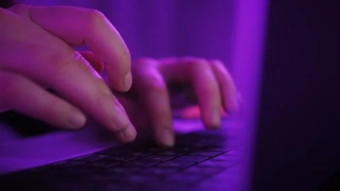 Hands typing working with portable computer laptop at table at home. Video stock 244775065