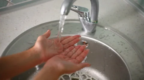 Hands under running water Stock Footage 1183794