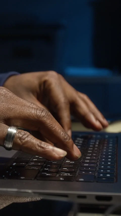Hands of Unknown Black IT Specialist Typing on Laptop in Office Setting Stock Footage 329618856