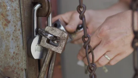 Hands Unlocking Lock 4k Stock Footage 92378633