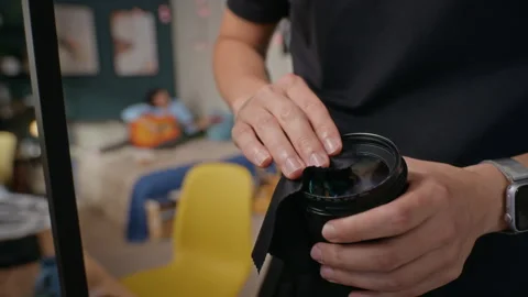 Hands of Unrecognizable Man Cleaning Camera Lens with Microfiber Cloth Stock Footage 341942962