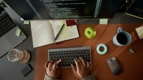 Hands of Unrecognizable Software Developer Typing Program Code on PC at Desk Stock Footage 306837885