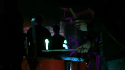 Hands use drum sticks at night concert show Stock Footage 111837987