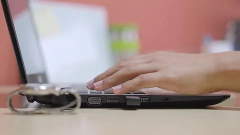 Hands using and typing on laptop computer Stock Footage 89556112