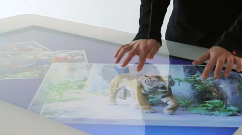 Hands using a business application on touch screen table panel. Stock Footage 62949083