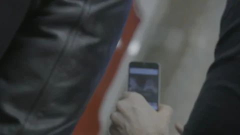 Hands using a cell phone in slow motion Stock Footage 102140673