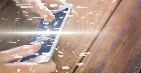 Hands using device with overlay Stock Photos