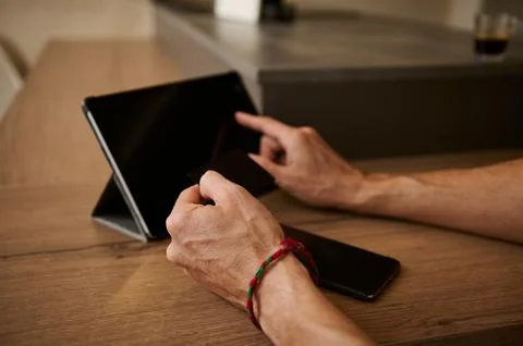 Hands using digital tablet for online shopping, receiving or making payment.. 写真素材