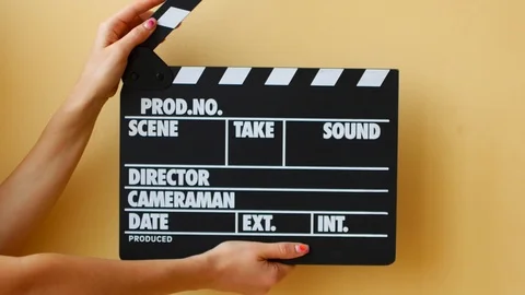 Hands using a film clapper board, close ... | Stock Video | Pond5