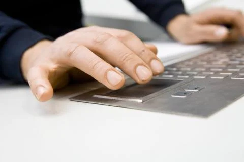 Hands using keyboard on control panel Stock Photos