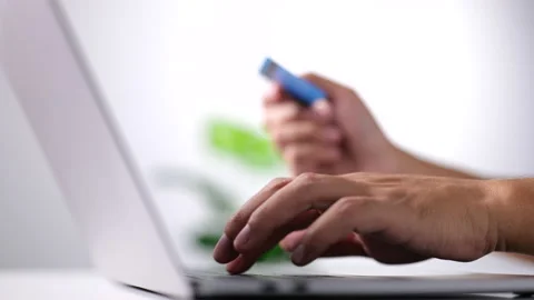 Hands using laptop and holding credit card. Online shopping concept. Stock Footage 160974981