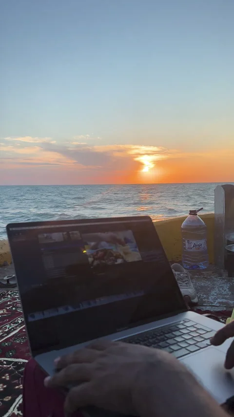 Hands Using Laptop Beside Ocean Stock Footage 346734076
