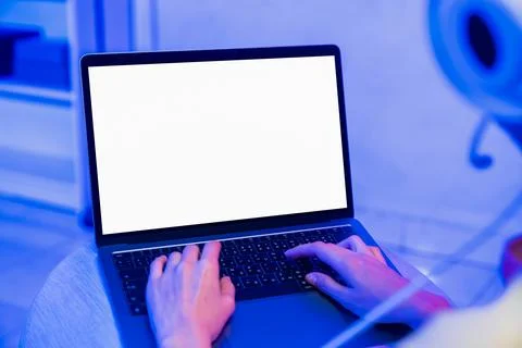 Hands using laptop with blank screen, computer mockup and digital technolog.. 스톡 사진