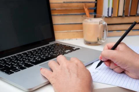 Hands using laptop computer. e-learning Stock Photos