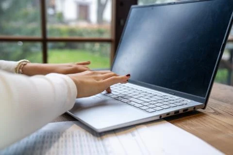 Hands Using Laptop Computer for Remote Work and Digital Productivity 스톡 사진
