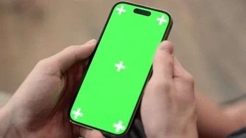 Hands using phone with chroma key green screen at home, advertising apps, games Stock-Footage 231320845