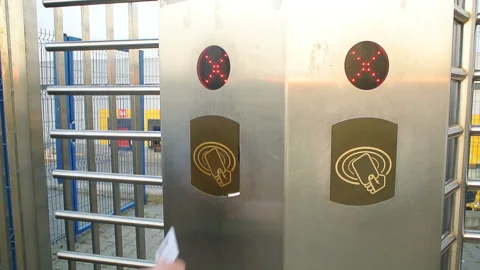 Hands using plastic cards to enter access system at plant factory Stock-Footage 107107558