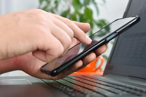 Hands using smart phone. Stock Photos