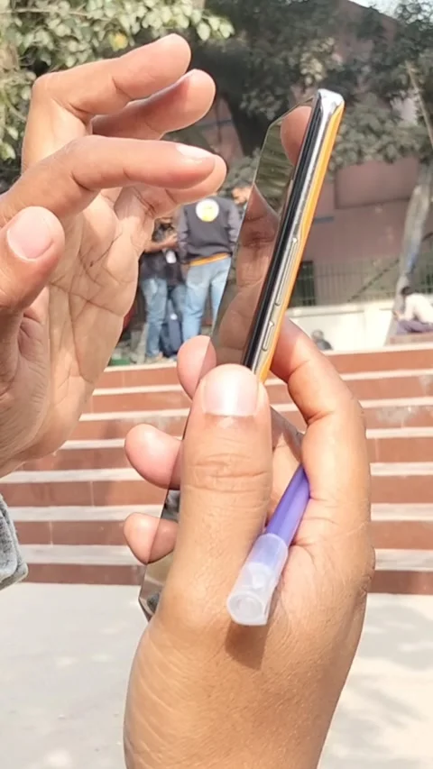 Hands Using Smartphone for Digital Process in Outdoor Environment Stock Footage 328000564