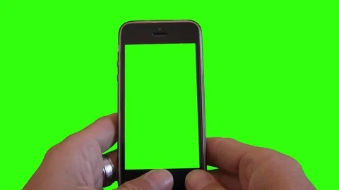 Hands Using Smartphone Over Green screen Stock Footage