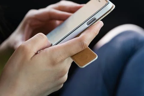 Hands using a Smartphone Stock Photos