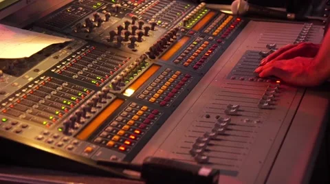 Hands using a sound digital mixer at a concert on stage Stock Footage 65324552