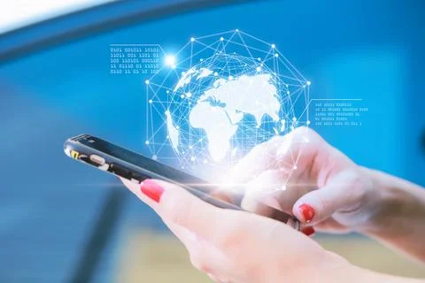 Hands using telephone device display business data. Mobile Technology concept Stock Photos