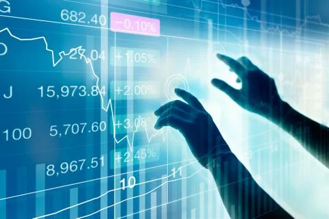 Hands using virtual screen device to check market data, stock market concept 스톡 사진