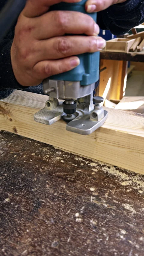 Hands Using Wood Router in Workshop Stock-Footage 337551444