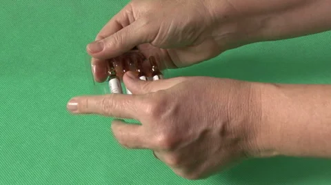 Hands, vials, packaging Stock Footage 59118225
