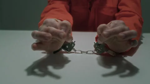 Hands of Violent Crime Suspect Fidgeting during Interrogation Video stock 276713394