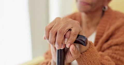 Hands, walking stick and senior woman with a disability, dementia or Alzheimer Stock Footage 246522863