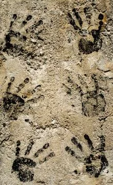 Hands on a wall Stock Photos