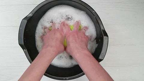 Hands wash clothes basin Stock Footage 86514877