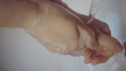 Hands wash slow motion Stock Footage 153034388