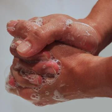 Hands washing Stock Photos